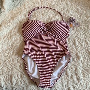 Strapless (with optional straps included) med-coverage, one piece bathing suit